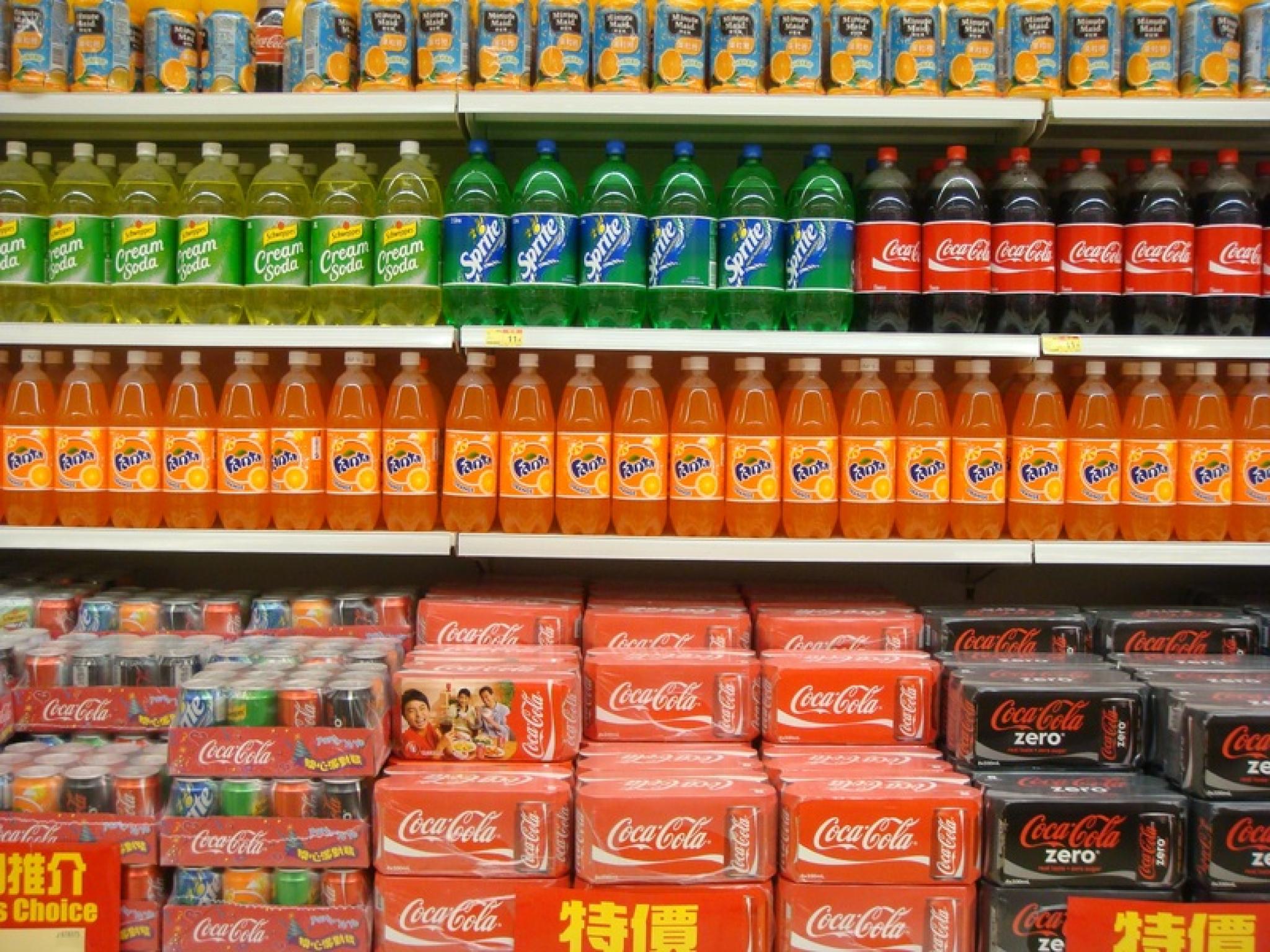 Colourful image of soft drinks on supermarket shelves from https://pxhere.com/en/photo/820730, free to use under CC0 Public Domain license 