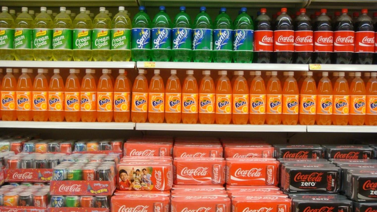 Colourful image of soft drinks on supermarket shelves from https://pxhere.com/en/photo/820730, free to use under CC0 Public Domain license 